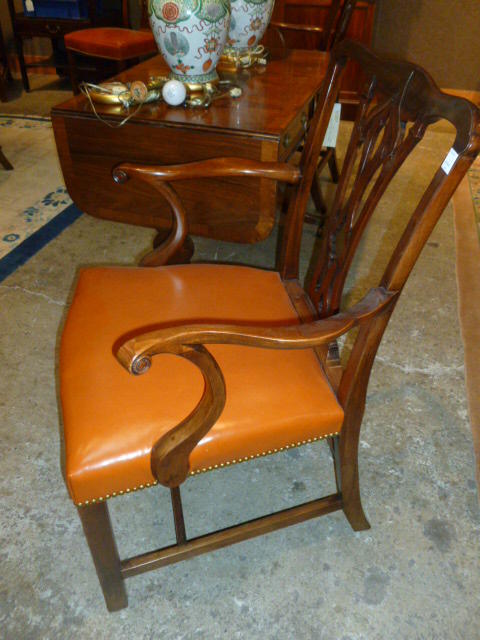 A set of eight George III style mahogany dining chairs