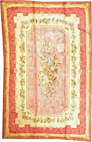 An French Savonnerie carpet France size approximately 6ft. 8in. x 10ft. 3in.