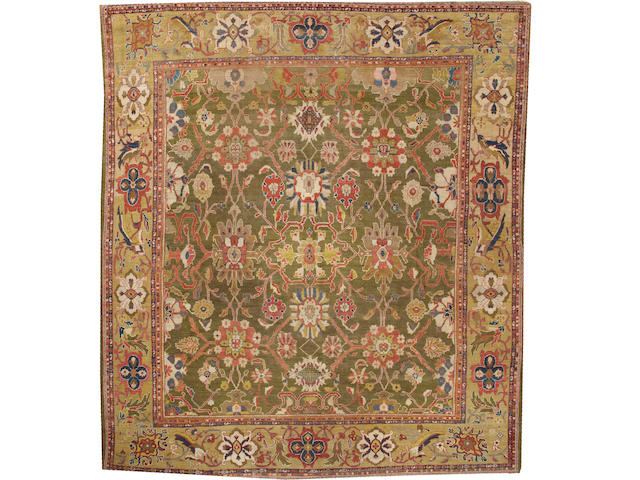 A Sultanabad carpet Central Persia size approximately 12ft. 3in. x 14ft.