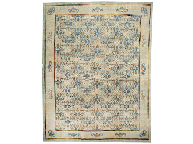 A Khotan carpet Turkestan size approximately 11ft. 8in. x 15ft.