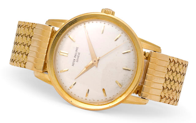 Patek Philippe. A fine 18K gold center seconds wristwatch with braceletRef:2481, Case No. 2607779, Movement No. 707651, circa 1959