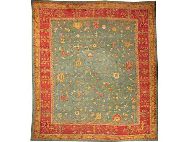 An Oushak carpet West Anatolia size approximately 12ft. 3in. x 14ft.