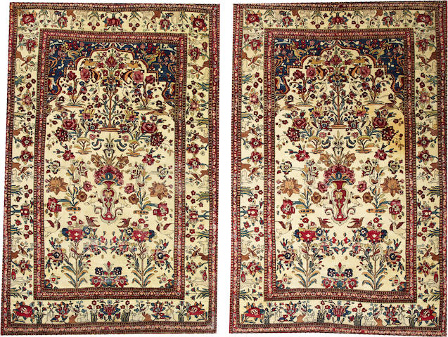 A Pair of Isphahan rugs South Central Persia sizes approximately: 4ft. x 7ft. 5in. &  4ft. 9in. x 7ft. 6in.