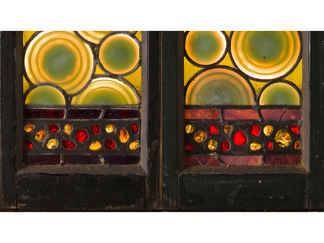 Two important Tiffany Studios leaded glass bullseye rondel and chipped glass windows Designed for St. Mark's Church, Islip, Long Island, 1887