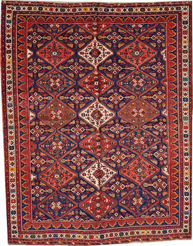 An Afshar rug Southwest Persia size approximately 5ft. 10in. x 7ft. 5in.