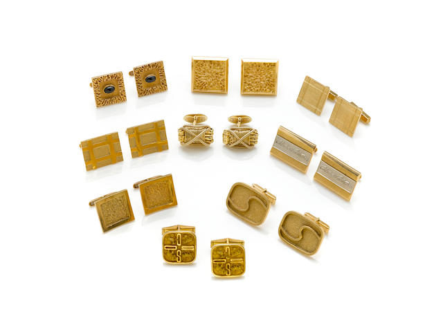 A collection of nine pairs of 14k yellow gold cuff links