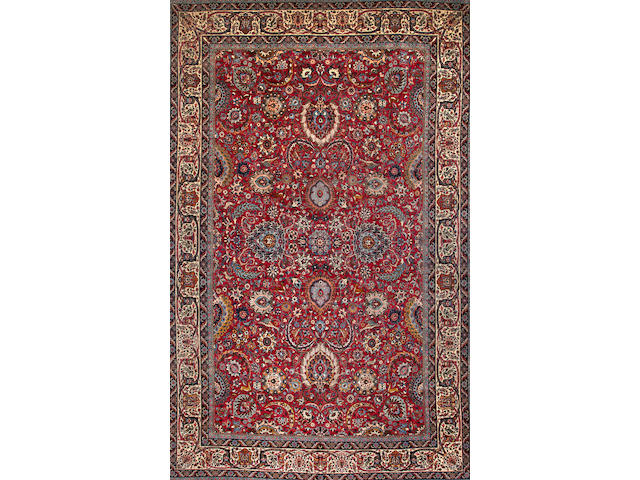 A Tehran carpet Central Persia size approximately 12ft. x 19ft.