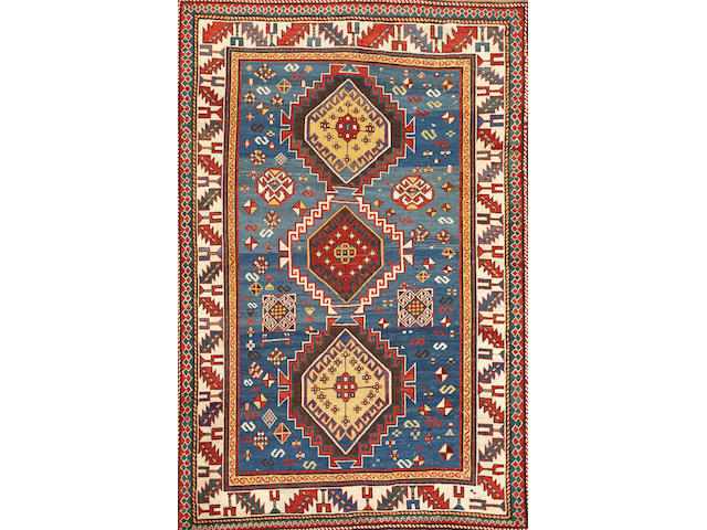 A Kazak rug Caucasus size approximatly 4ft. 5in. x 6ft. 7in.