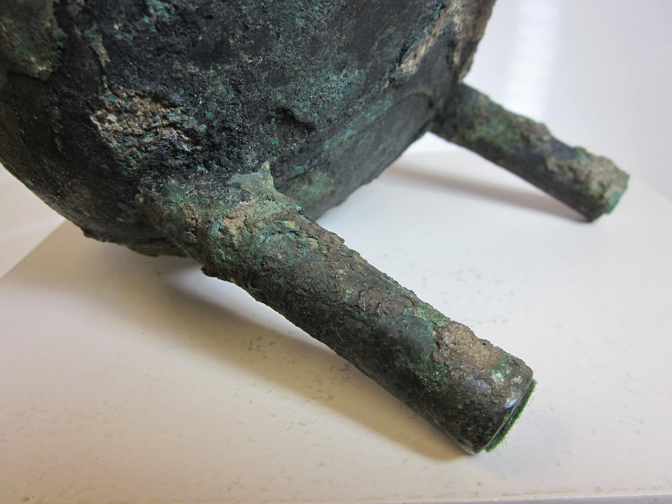 An archaic bronze tripod, ding Late Shang dynasty