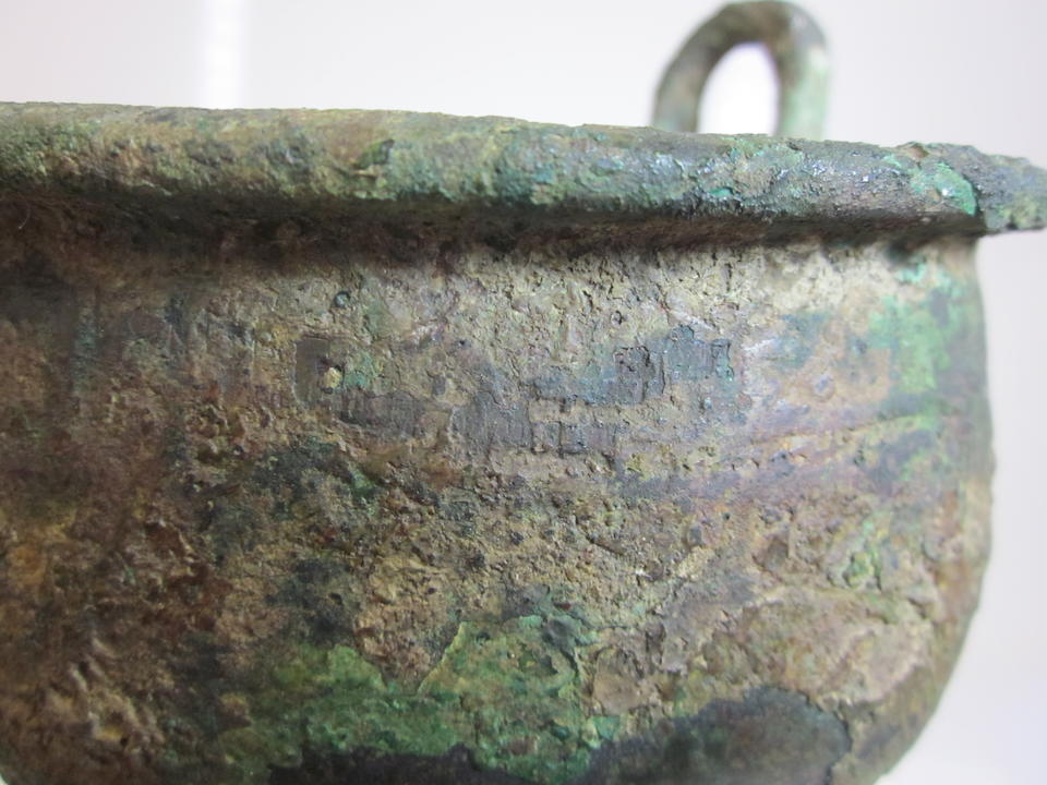 An archaic bronze tripod, ding Late Shang dynasty