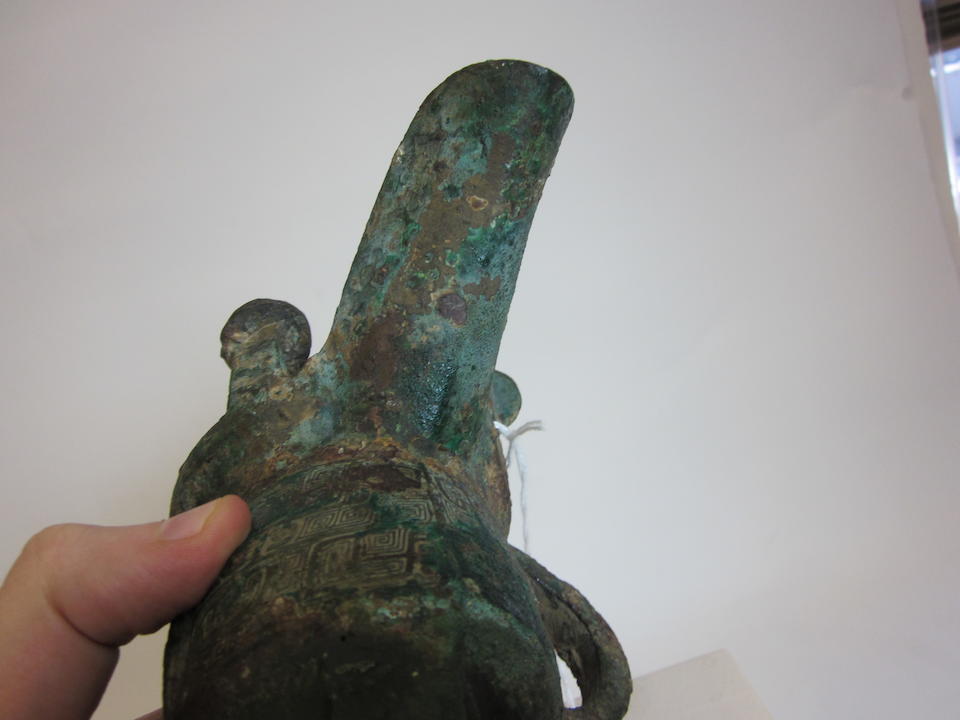 A cast bronze wine vessel, jue Shang dynasty