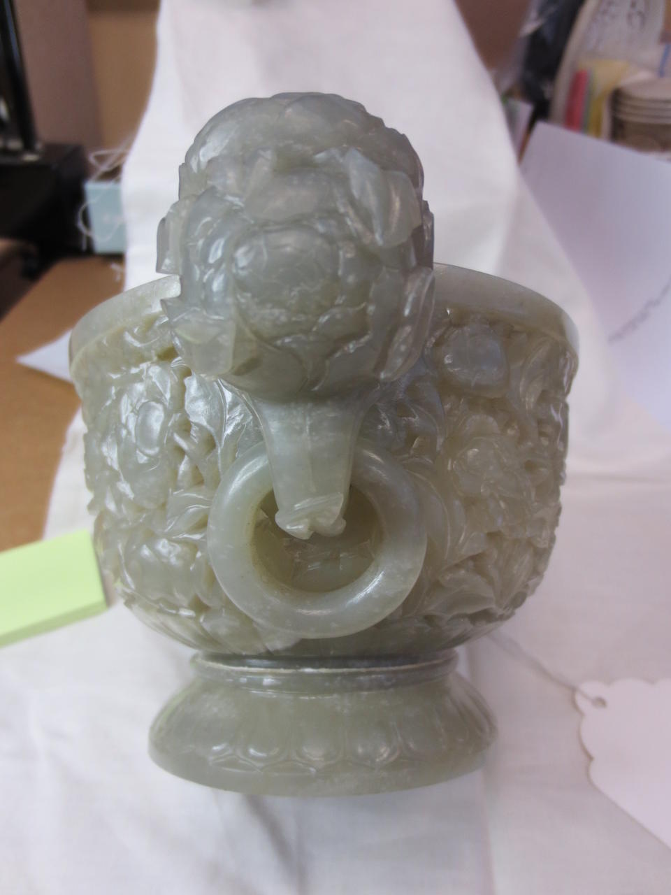 A reticulated greenish-white jade covered censer
