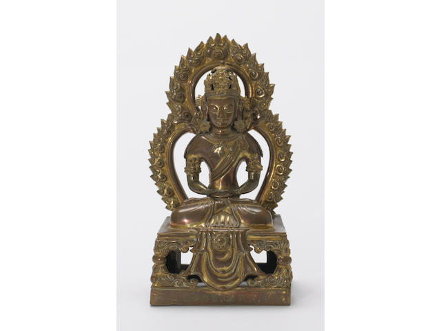 A Qing style gilt bronze figure of Amitayus
