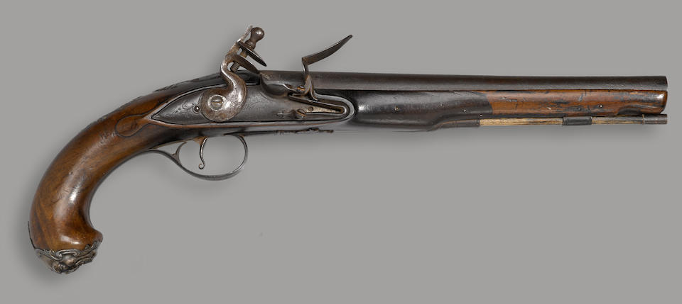 A silver-mounted English flintlock pistol by Wilson -Select US Arms Type-