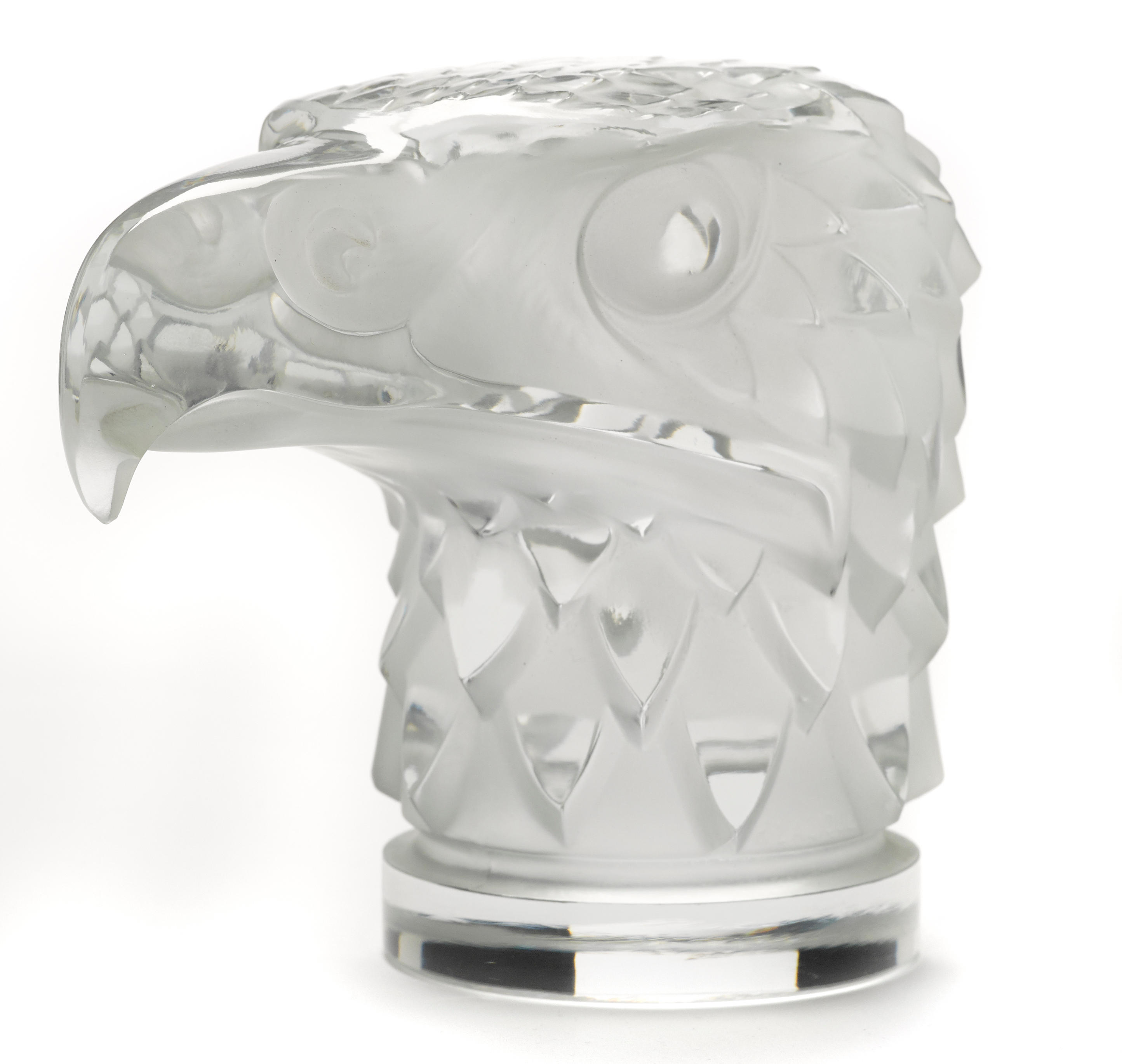 A 'Tete d'Aigle' glass mascot by René Lalique, French,