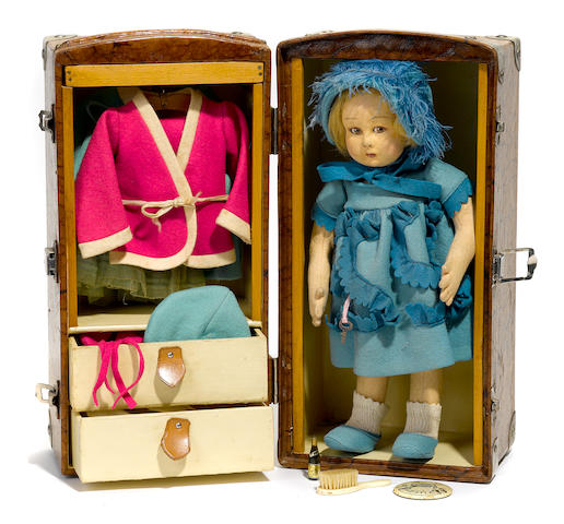 A Lenci felt girl doll with rare trunk