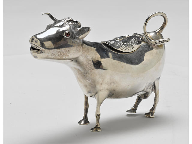 A Dutch 833 standard silver cow-form cream jug 19th century