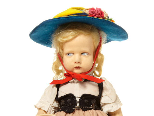 A Lenci felt girl doll in traditional Swiss costume