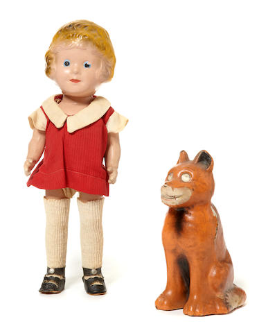 A pair of composition figures of the comic characters Little Orphan Annie and her dog Sandy
