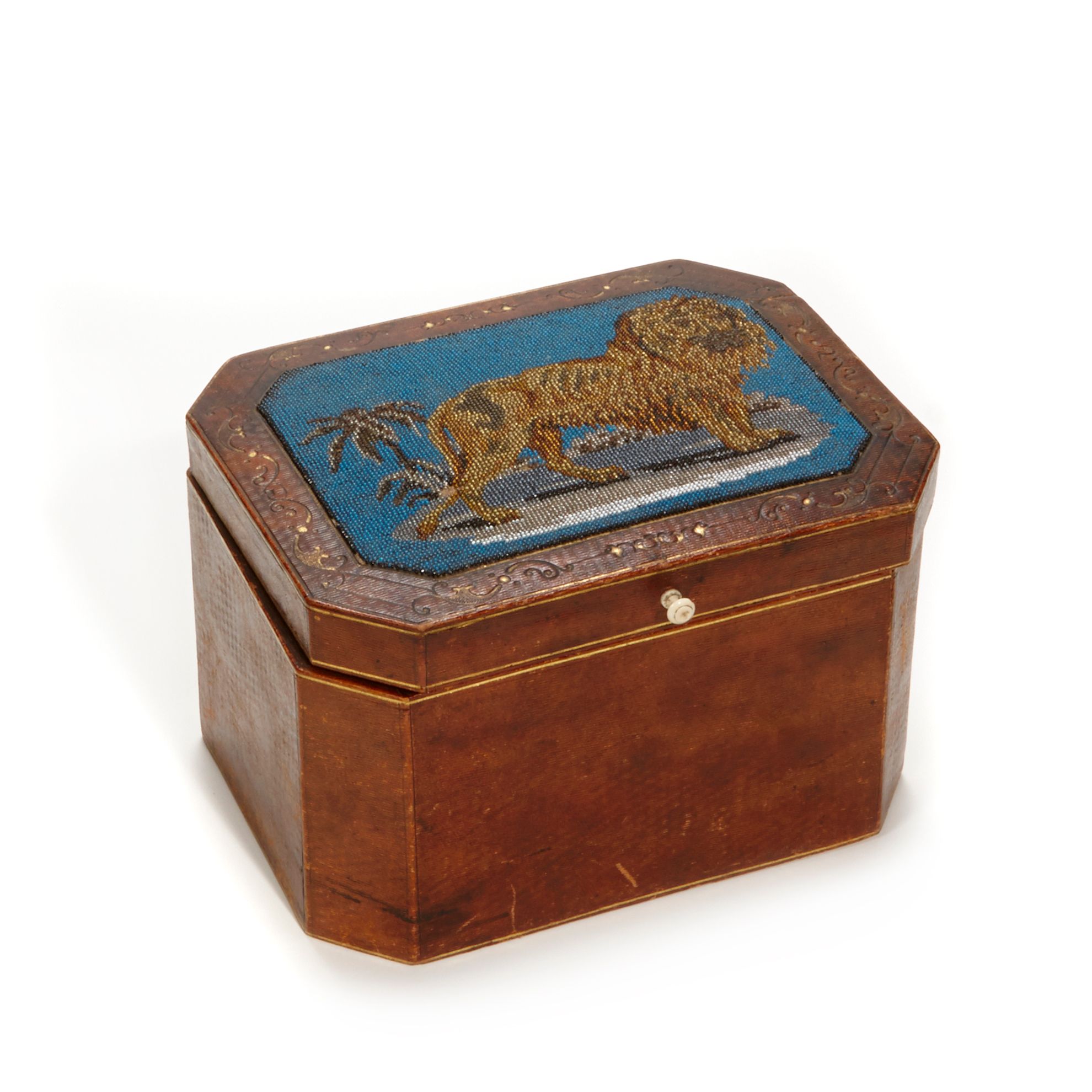 A Regency beadwork and leather tea caddy