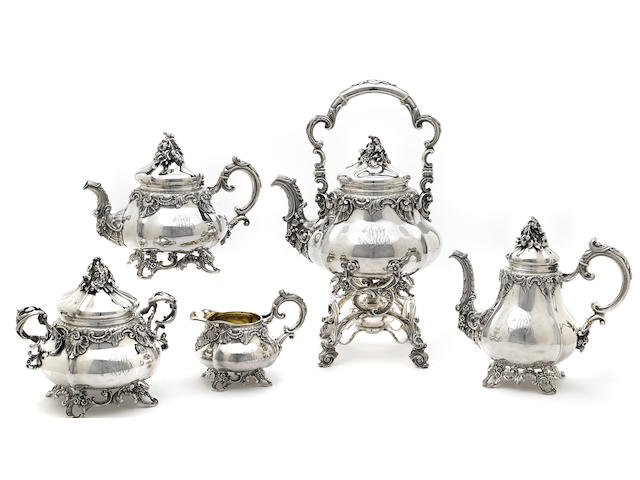 A French first standard silver Rococo style five-piece tea and coffee service, with original canteen by Antoine Cosson; retailed by Cosson-Corby,  Paris, mid-19th century
