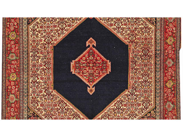 A Senneh Haft Rang rug Central Persia size approximately 4ft. 5in. x 7ft.