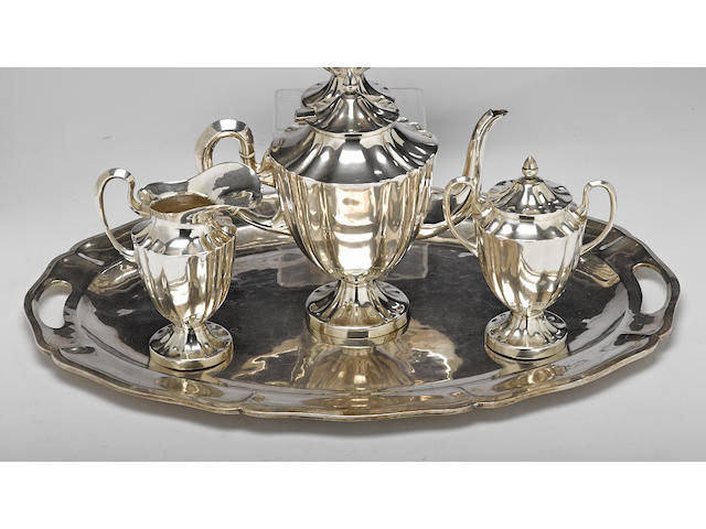 A Mexican sterling silver four-piece tea and coffee service, with matching two-handled tray marked Anexo, 20th century