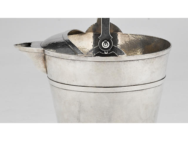 An American hammered sterling silver Arts & Crafts ice bucket by Shreve & Co., San Francisco, CA, first quarter 20th century
