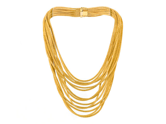 An eighteen karat gold multi-strand bib necklace
