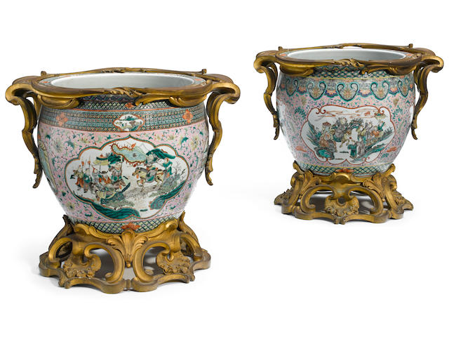 An impressive matched pair of French gilt bronze mounted and Chinese porcelain fish tanks late 19th century
