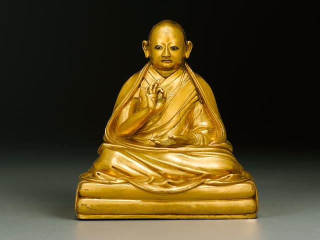 A gilt copper alloy figure of Lobzang Gyatso Tibet, 18th century