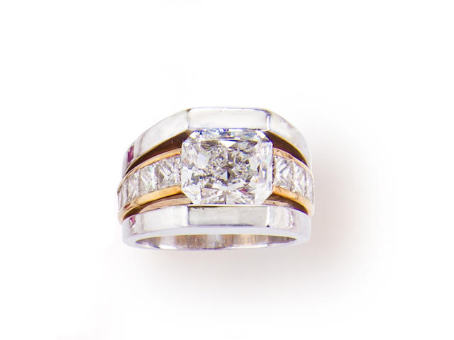 A diamond, platinum and eighteen karat gold ring