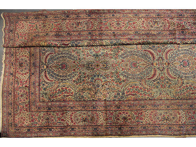 A Kerman carpet size approximately 13ft. 3in. x 19ft. 3in.