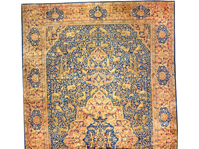 An Indian carpet India size approximately 15ft. 2in. x 26ft. 9in.