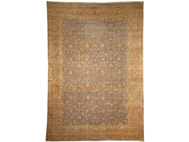 A Kerman carpet South Central Persia size approximately 12ft. 6in. x 18ft.