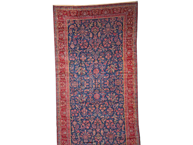 A Manchester Kashan carpet Central Persia size approximately 11ft. 9in. x 22ft. 2in.