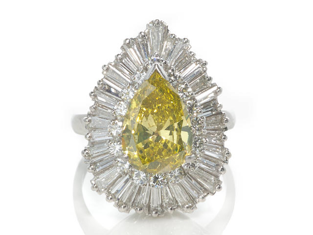 An irradiated colored diamond and diamond ballerina ring
