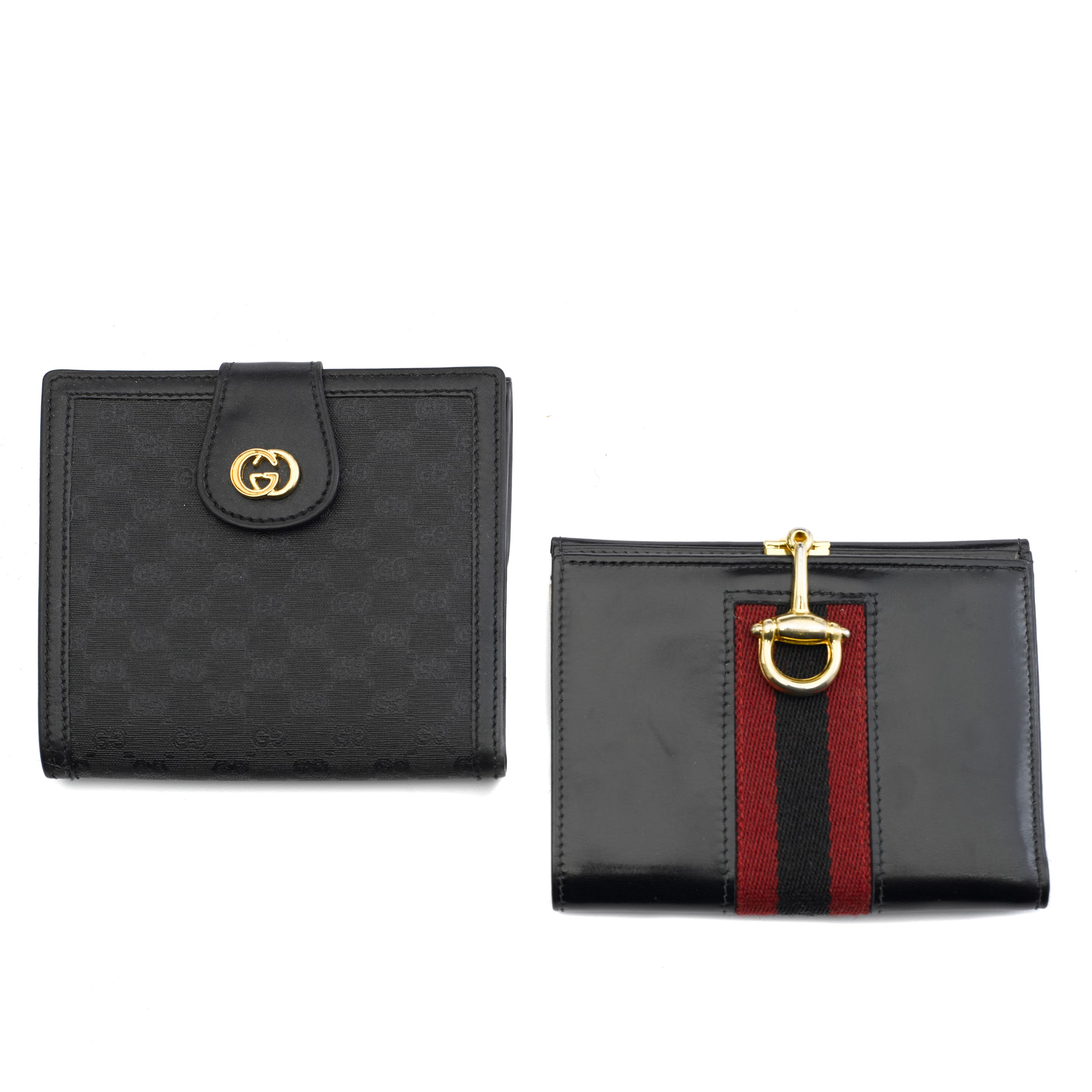 Two Gucci black wallets