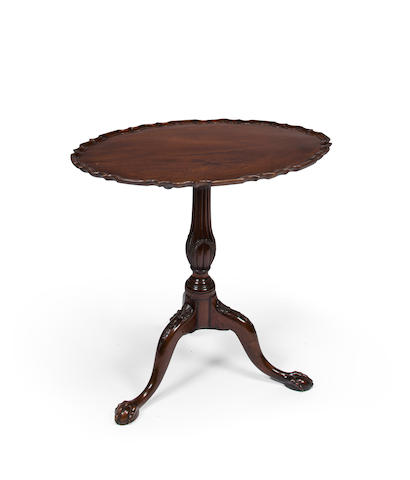 A George III carved mahogany oval tilt-top tea table late 18th century