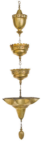 A German bronze hanging Judenstern (Sabbath lamp) 19th centurytrefoil loop, six pointed star-form oil container; drip bowl hangs from base of shaft. The whole attached to cylindrical shaft pierced with architectural motif, suspended by a segmented shaft.