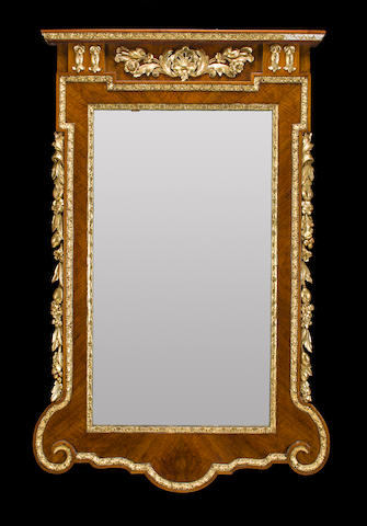 A George II style parcel-gilt walnut mirror 20th century