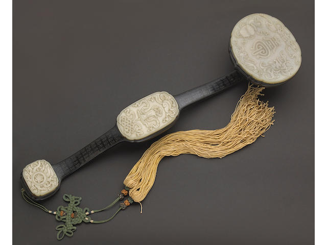 A jade and hardwood scepter with silver wire inlay