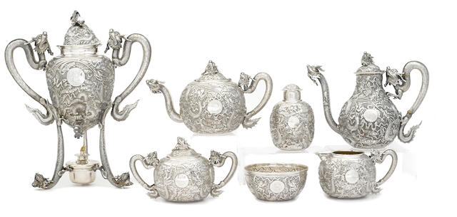 A Chinese Export  silver  seven-piece tea and coffee service undersides of teapot, coffee pot, tea caddy and burner with character marks and marked for Woshing, Shanghai,  fourth quarter 19th century