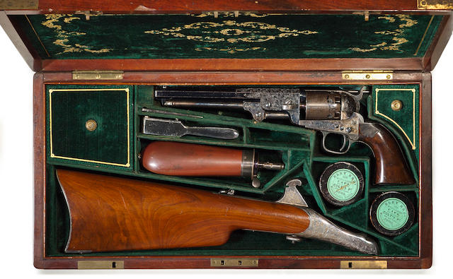 An engraved Colt Model 1851 Navy percussion revolver with shoulder stock in deluxe casing