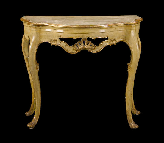 An Italian Rococo painted and parcel gilt console tablethird quarter 18th century