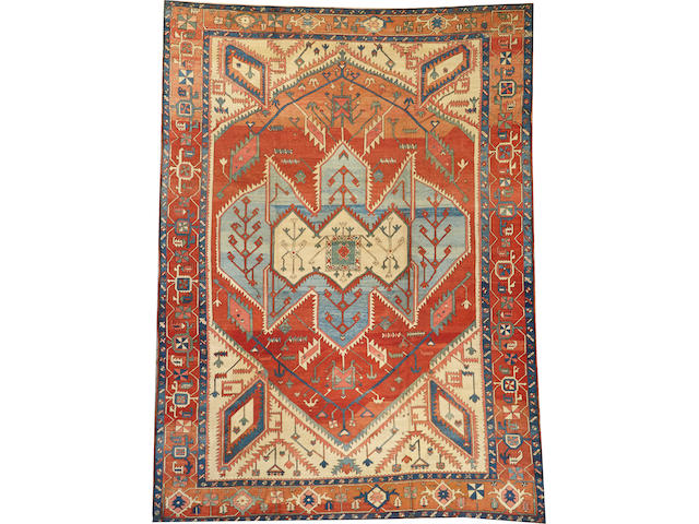 A Serapi carpet  Northwest Persia size approximately 11ft. 2in. x 15ft. 1in.