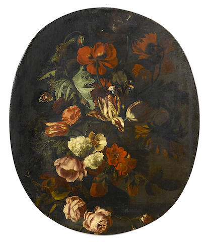 Studio of Simon Pietersz. Verelst (The Hague 1644-1721 London) A still life with roses, tulips and other flowers oval, 33 1/2 x 28in (85.1 x 71.1cm) unframed