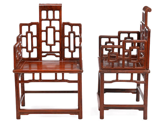 A pair of hardwood chairs