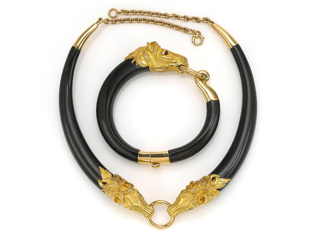 A horn and eighteen karat gold necklace together with a bangle bracelet, French