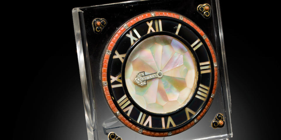 Cartier. A fine Art Deco rock crystal, mother of pearl, onyx, diamond and coral boudoir clock Signed European Watch and Clock Co., France, No. 1866 / 3358, with Cartier reference No. 970, 1920's